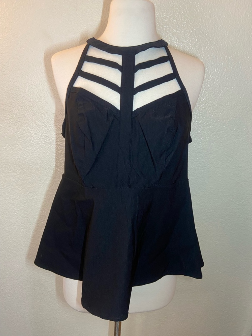 Torrid Caged High Neck
Peplum Top in black. Size:00(M) - Picture 2 of 11